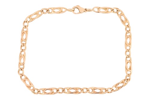 Lot 140 - A fancy curb link bracelet, completed with a...