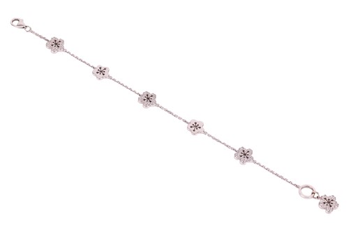 Lot Boodles - A diamond-set 'Blossom' charm...