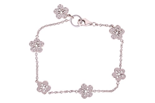 Lot Boodles - A diamond-set 'Blossom' charm...