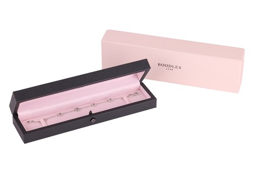 Lot Boodles - A diamond-set 'Blossom' charm...