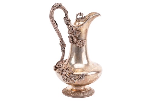 Lot 383 - Benjamin Smith. A silver claret jug, baluster...