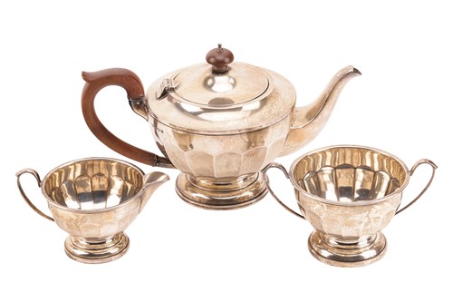 Lot 385 - A 20th-century silver three-piece tea set of...