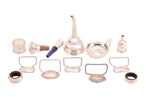 Lot 354 - An agglomeration of wine-related silver items,...