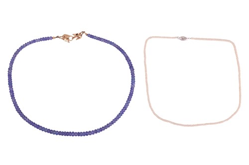 Lot 91 - Two strands of beaded necklaces; to include a...