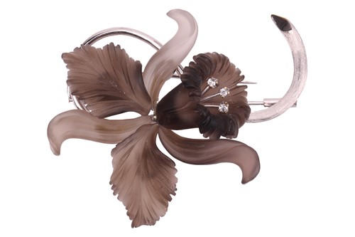 Lot 54 - A carved smoky quartz orchid brooch, the...