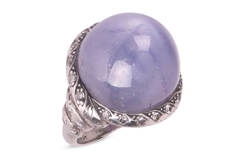 Lot 51 - An Art Deco Ceylon star sapphire and diamond...