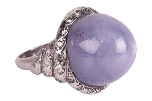 Lot 51 - An Art Deco Ceylon star sapphire and diamond...