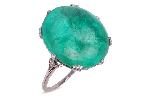 Lot 43 - A Belle Epoque Colombian emerald cabochon...