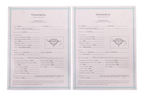 Lot 235 - Tiffany & Co. - a pair of single stone diamond...