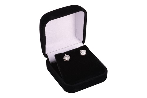Lot 235 - Tiffany & Co. - a pair of single stone diamond...