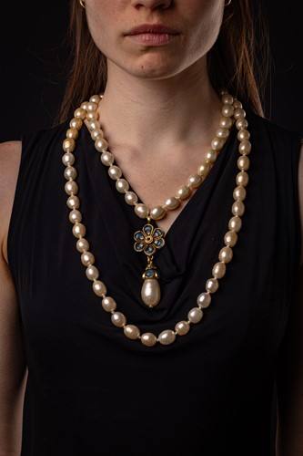Lot 247 - Chanel - a double-row faux pearl and gripoix...
