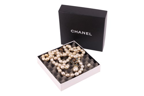 Lot 247 - Chanel - a double-row faux pearl and gripoix...