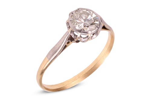 Lot 22 - A diamond solitaire ring, claw-set with a...