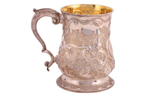 Lot 395 - A George III silver baluster tankard, London...