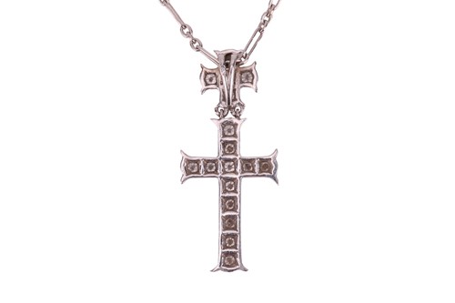 Lot 227 - Dior - a diamond-set double cross pendant on...