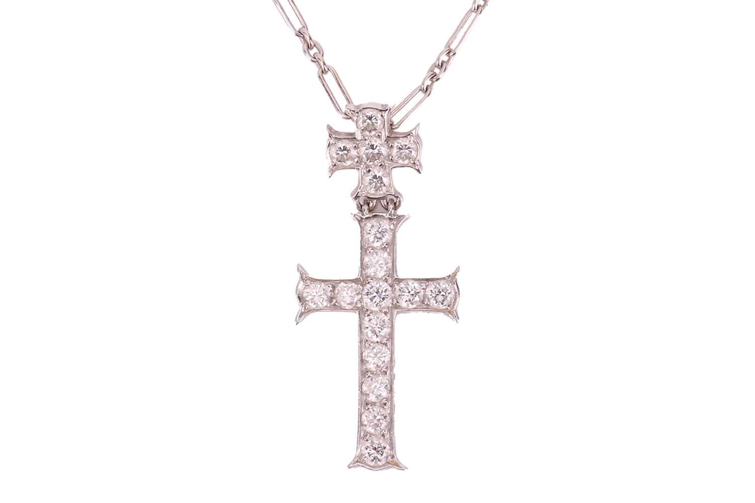 Lot 227 - Dior - a diamond-set double cross pendant on...