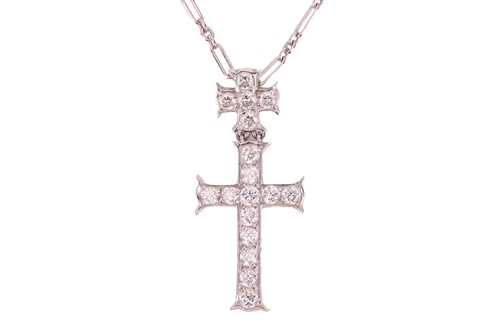 Lot 227 - Dior - a diamond-set double cross pendant on...