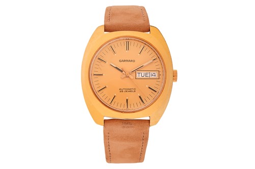 Lot 119 - Garrard – A Gold-Plated Wristwatch Bezel:...