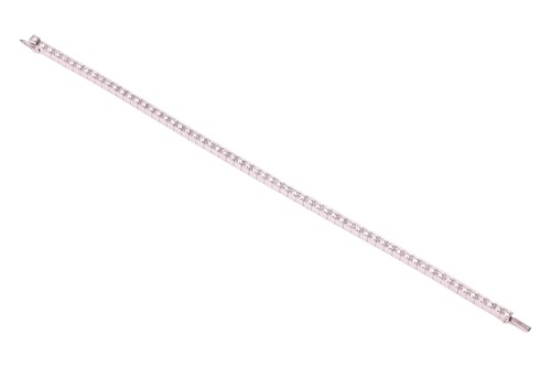 Lot 232 - Cartier - a Lanière diamond line bracelet,...