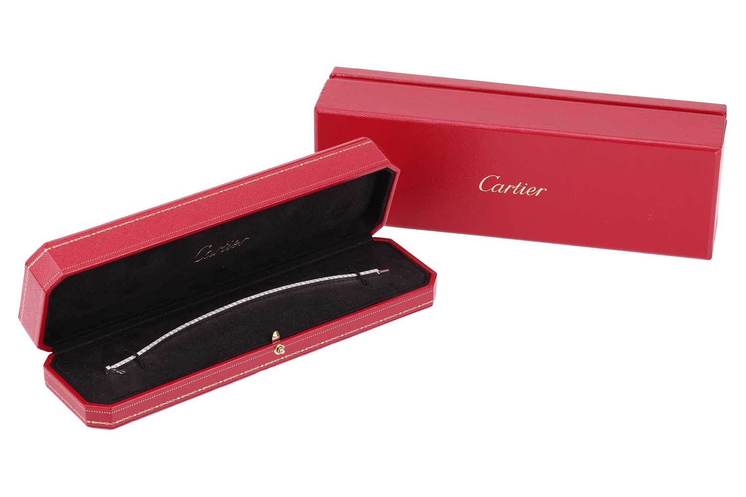 Lot 232 - Cartier - a Lanière diamond line bracelet,...