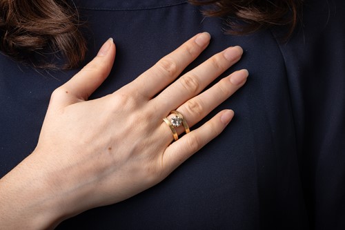 Lot 71 - A diamond solitaire ring, of Modernist-style...