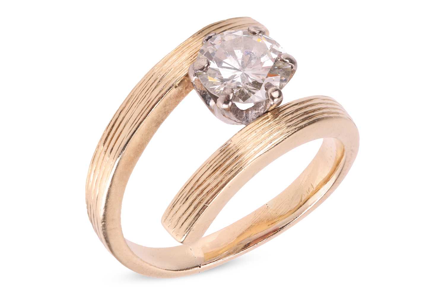 Lot 71 - A diamond solitaire ring, of Modernist-style...