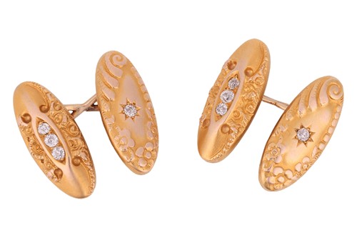Lot 215 - A pair of diamond-set cufflinks, of elongated...