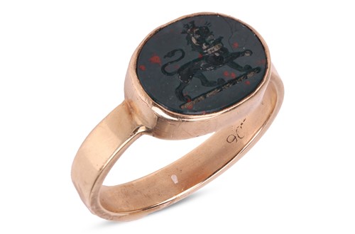 Lot 321 - A gem-set signet ring, composed of an oval...