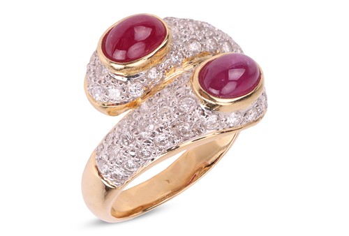 Lot 263 - A gem-set crossover ring, each terminal...