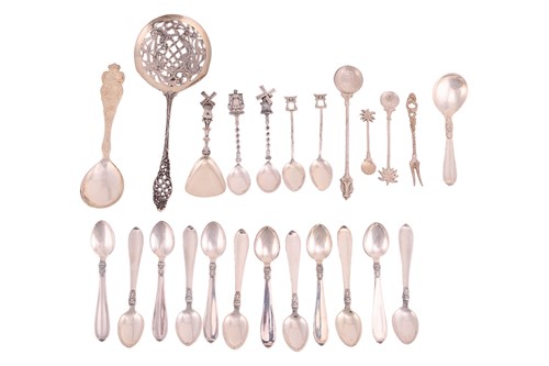 Lot 409 - A set of twelve "Mid Century Vintage" Danish...