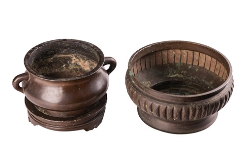Lot 53 - A Chinese bronze two-handled censer of squat...
