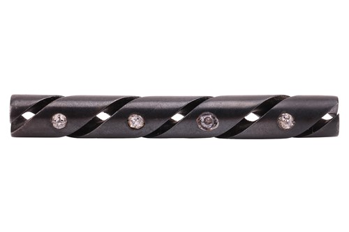 Lot 41 - A diamond-set steel brooch, the cylindrical...