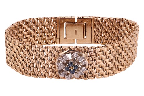 Lot 72 - A gem-set bracelet of floral design, centred...