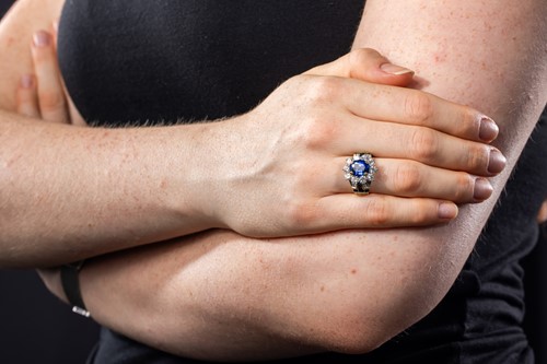 Lot 299 - An unheated Burmese sapphire and diamond dress...