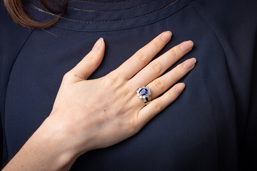 Lot 299 - An unheated Burmese sapphire and diamond dress...
