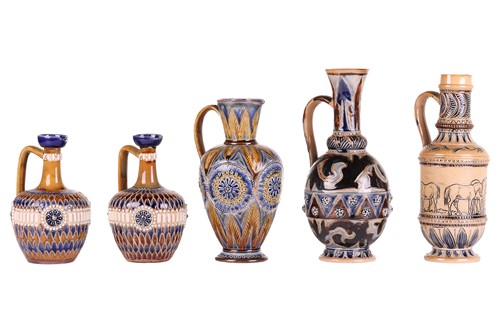 Lot 153 - A Doulton Lambeth tall stoneware jug, with...