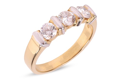 Lot 206 - A diamond three-stone dress ring, with an...