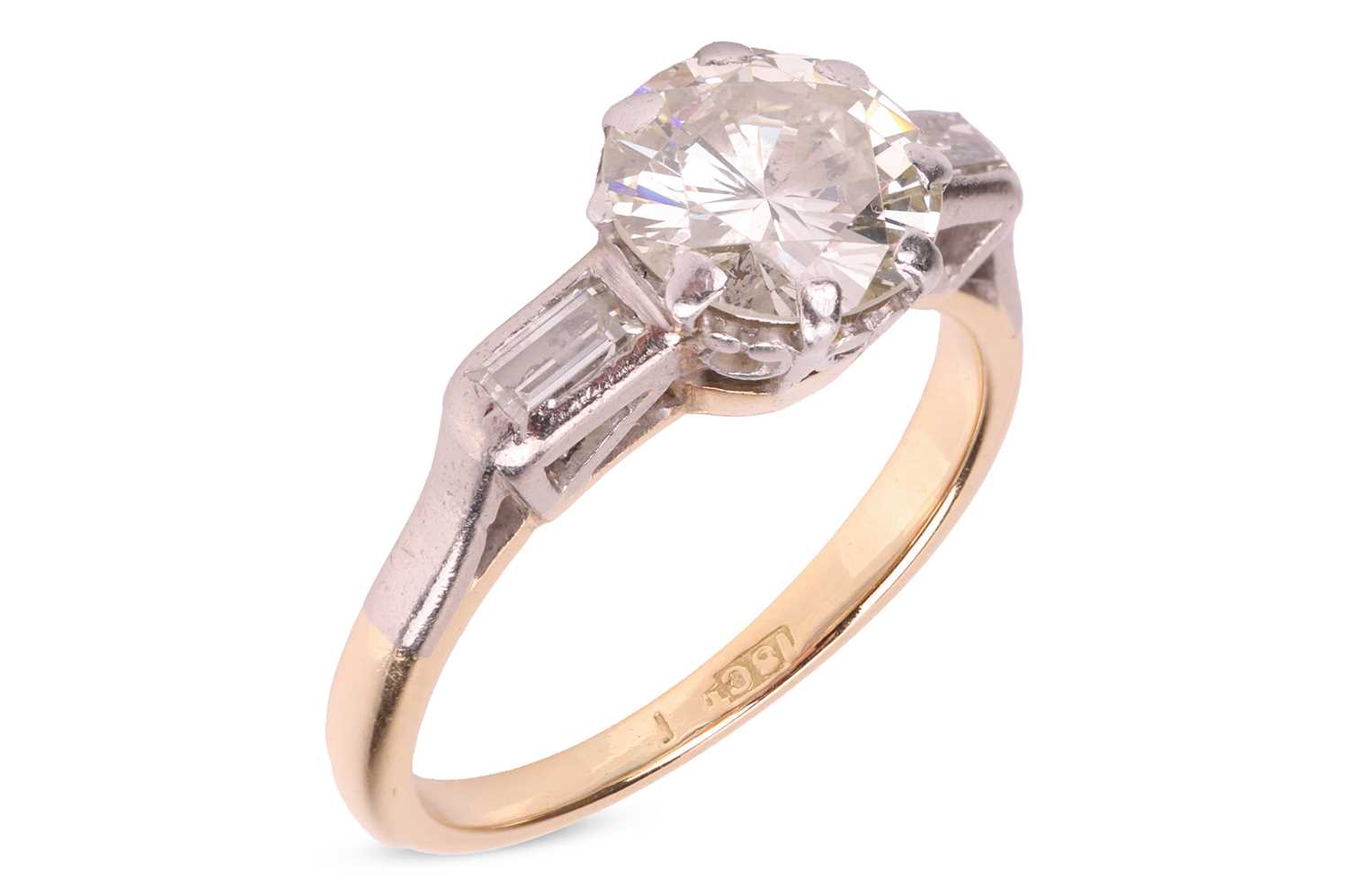 Lot 47 - A diamond solitaire ring, the central diamond...