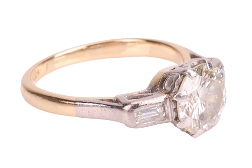 Lot 47 - A diamond solitaire ring, the central diamond...