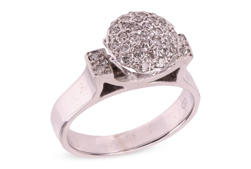 Lot 278 - A diamond-set dress ring, the raised circular...