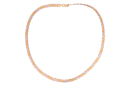 Lot 80 - A tri-coloured braided necklace, consisting of...