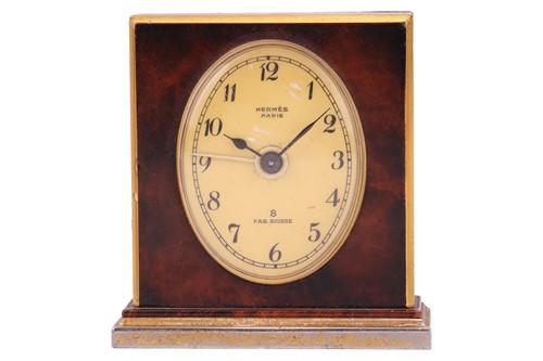 Lot 137 - A Hermes of Paris, 8-day travel alarm clock,...