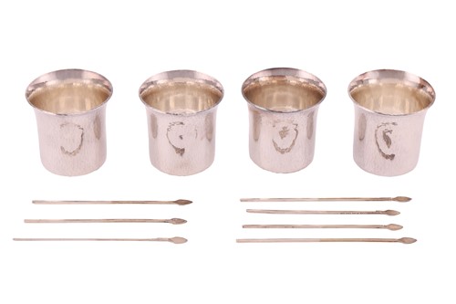 Lot 401 - A set of four Swedish white metal punch cups...