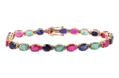 Lot 141 - A multi-gem set bracelet, composed of oval...