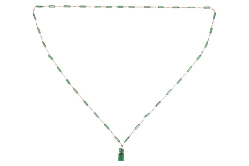 Lot 135 - A long jadeite link chain, comprising a series...