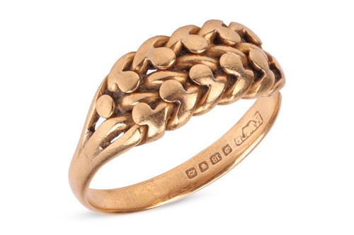 Lot 81 - A braided ring in 18ct yellow gold, of woven...