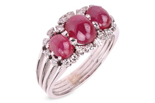 Lot 187 - A ruby cabochon and diamond dress ring,...