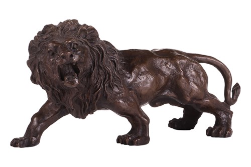 Lot 132 - A patinated bronze figure of snarling male...