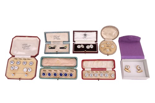 Lot 54 - A matched gold, mother-of-pearl and sapphire...