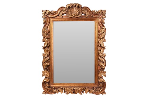 Lot 68 - An Italian-style giltwood wall mirror with...